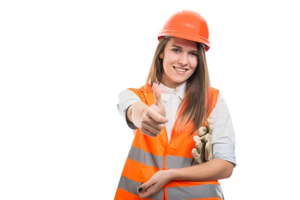 Piękna młoda kobieta Konstruktor trzymając kciuk do góry — Zdjęcie stockowe
