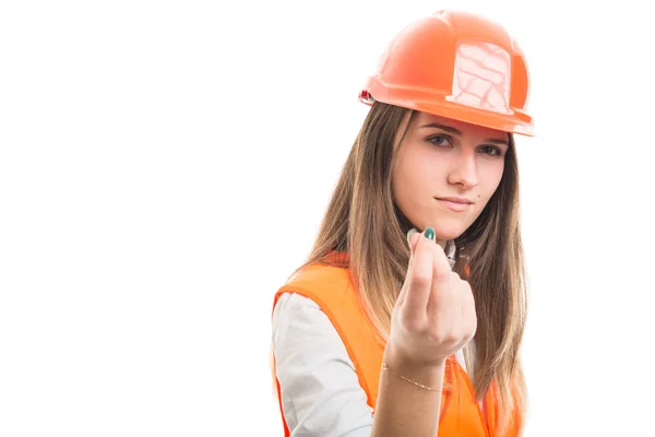 Hermosa chica constructor haciendo gesto de dinero —  Fotos de Stock