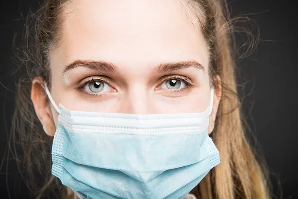 Close-up of doctor portrait  posing with sterile mark on — Stock Photo, Image