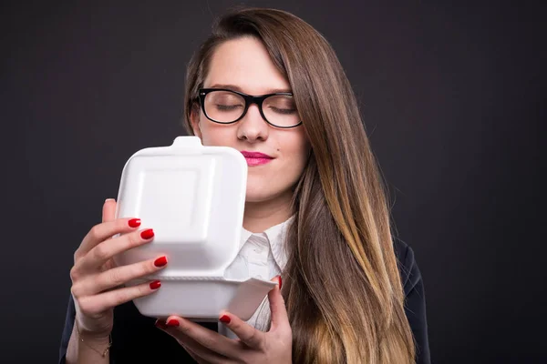 Pretty successful woman smell her fresh food — Stock Photo, Image
