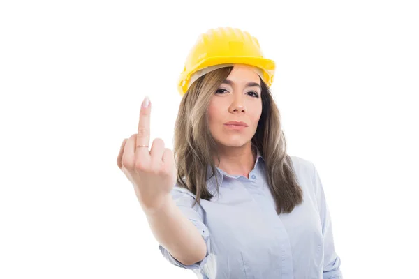 Retrato de construtora feminina mostrando gestos obscenos — Fotografia de Stock