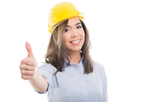 Retrato del constructor femenino mostrando como gesto —  Fotos de Stock