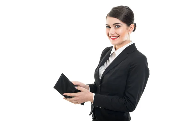 Beautiful female flight attendant looking in wallet and smiling — Stock Photo, Image