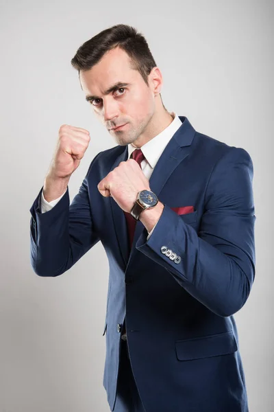 Attractive business man holding fists like fighting — Stock Photo, Image
