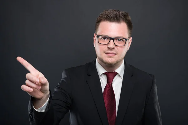 Portrait of business man wearing black suit showing denial gestu — Stock Photo, Image