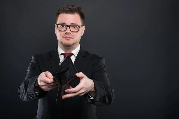Portrait of business man showing empty walle — Stock Photo, Image