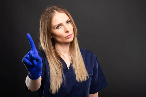 Kobieta dentysty sobie zarośla wyświetlone wyświetlone odmowa gestur — Zdjęcie stockowe