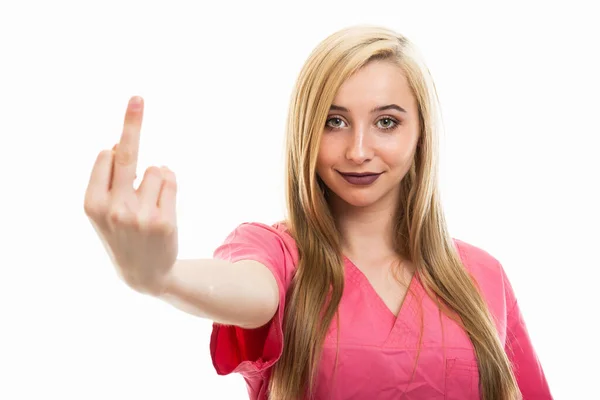 Portrait Young Female Nurse Wearing Scrubs Showing Obscene Gesture Isolated — Stock Photo, Image