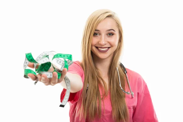 Portrait Female Doctor Wearing Scrubs Holding Measuring Tape Isolated White — Stock Photo, Image