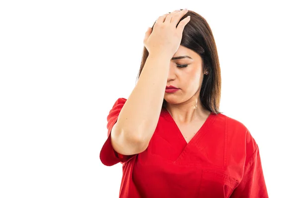 Portrait Doctor Wearing Scrubs Holding Head Hurt Isolated White Background — Stok Foto