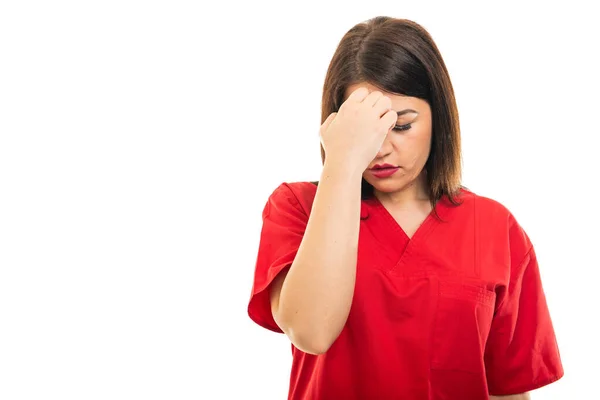 Portrait Beautiful Young Doctor Wearing Scrubs Making Headache Gesture Isolated — Stock Photo, Image