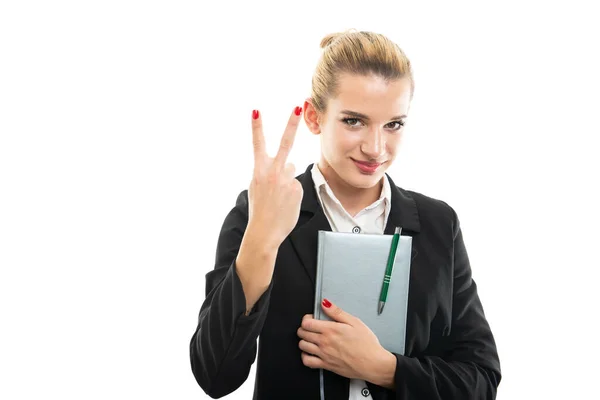 Young Female Assistant Manager Holding Agenda Showing Number Two Isolated — Stock Photo, Image