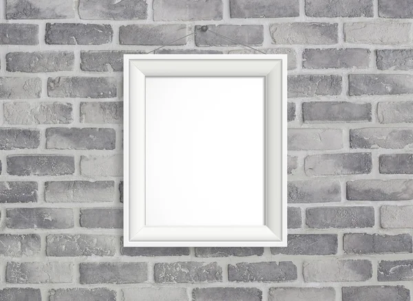 Blank frame on grey birck wall — Stock Photo, Image