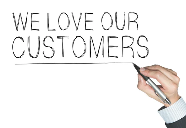 We love customers written by hand — Stock Photo, Image
