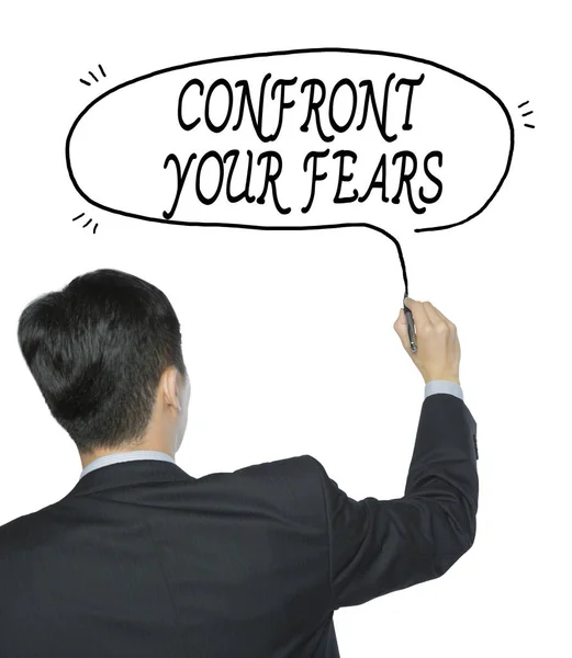 Confront fears written by man — Stock Photo, Image
