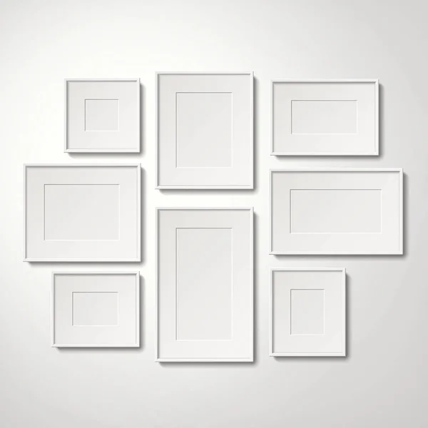 Blank white picture frames — Stock Vector