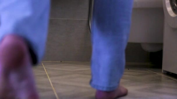 Man Goes Toilet Takes His Jeans — Stock Video