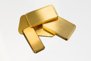 Altın tuğlalar, beyaz arkaplan, ışık yansımaları