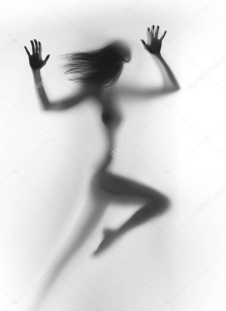 Dynamic sporty woman body silhouette runs, hands, long hair