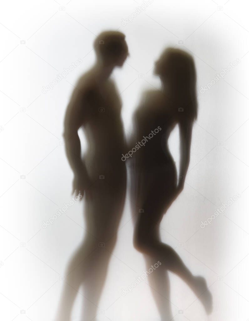 Pretty, attractive sexy couple together, beautiful and perfect body silhouette.