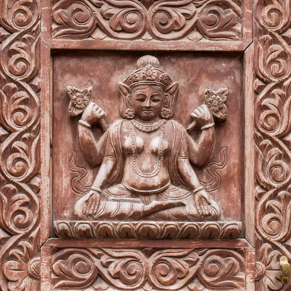 Detail wooden carved door in hindu temple, Kathmandu, Nepal background. Close up — Stock Photo, Image