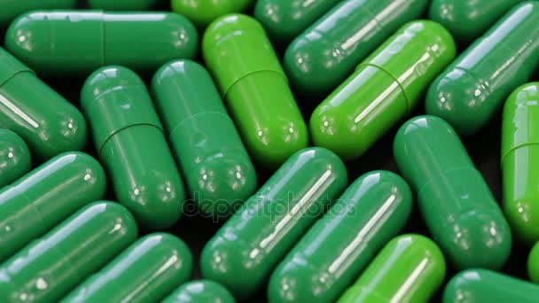 Group green medical pills, rotation — Stock Video