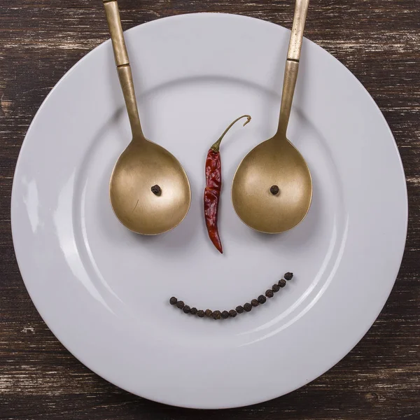 Happy face on dish plate — Stock Photo, Image