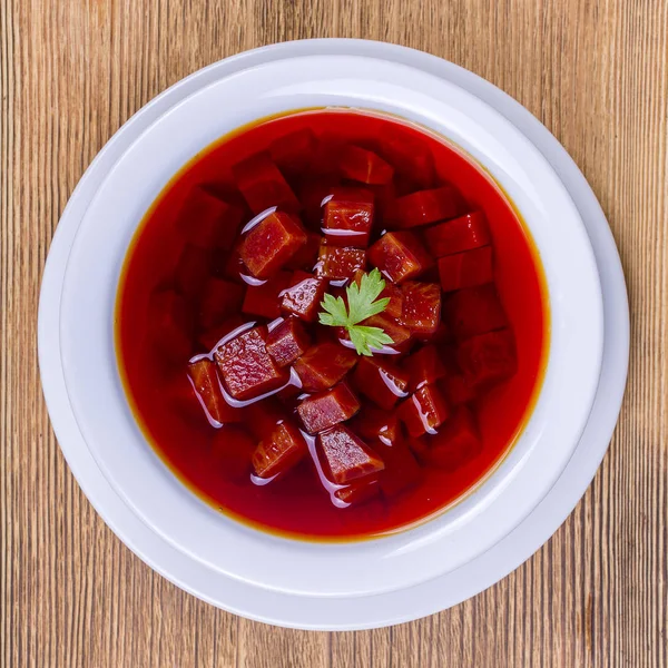 Close up of russian or ukrainian cold vegetable beetroot soup on the table — Stock Photo, Image