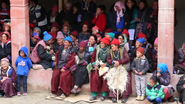 Buddhist old people during Tsam mystery dance in time of Yuru Kabgyat Buddhist festival at Lamayuru Gompa, Ladakh, North India — Stock Video