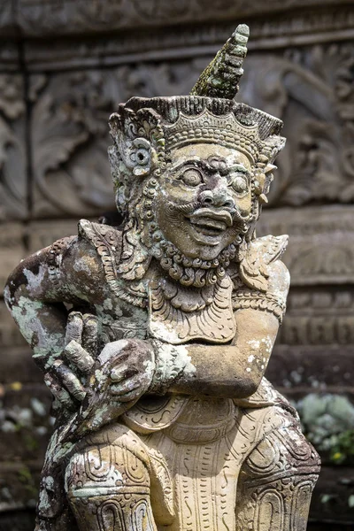 Traditional stone sculpture in temple. Ubud, island Bali, Indonesia — Stock Photo, Image