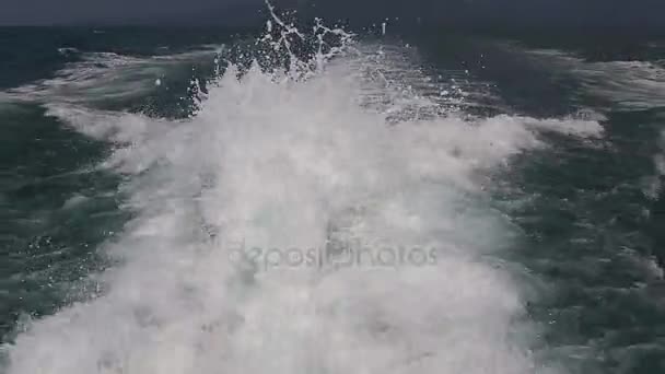 Blue ocean sea water wave with fast yacht boat wake foam of prop wash — Stock Video