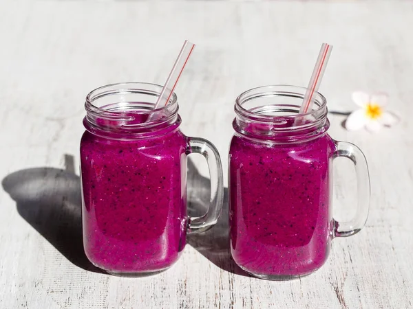 Fresh smoothies from a dragon fruit, banana, mango and papaya. Island Bali, Ubud, Indonesia — Stock Photo, Image