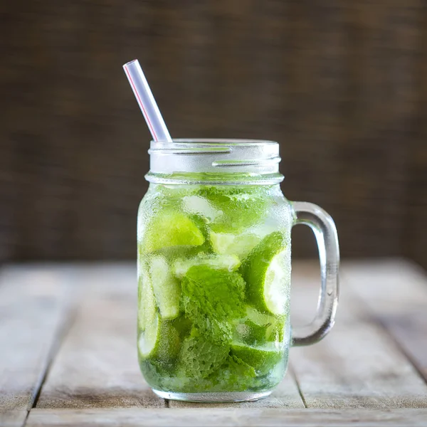 Lemon fruit Caipirinha alcoholic beverage of Brazil on wooden table