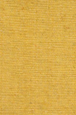 Arka plan ve doku kumaş sarı. Yakın çekim