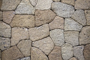 Arka plan için eski kaya duvarının dokusu