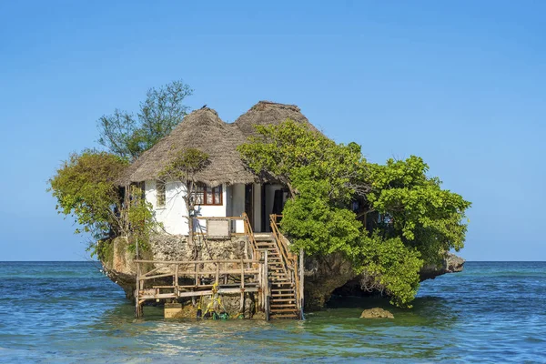 Home on the rock on high tide in sea water on the island of Zanzibar, Tanzania, Africa — 图库照片