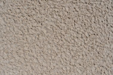 Yağmurdan sonra tropikal bir plajda deniz kumu dokusu.