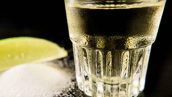 A misted glass of tequila in focus — Stock Photo, Image