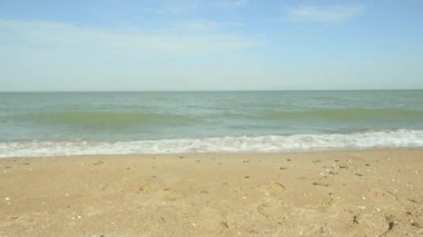Sandy beach ve su üzerinde biraz heyecan