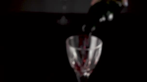 Slow mo movement of the camera on a glass of wine — Stock Video