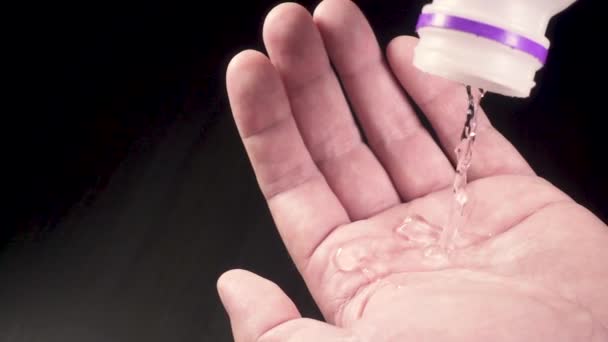 Last drops of water fall into the mans palm — Stock Video