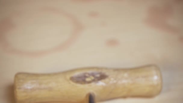 Blurred footage of corkscrew and wine cork — Stock Video