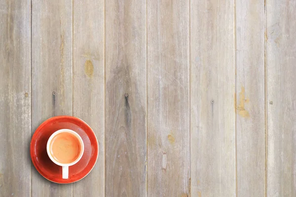 Cup of coffee on wooden table background — Stock Photo, Image