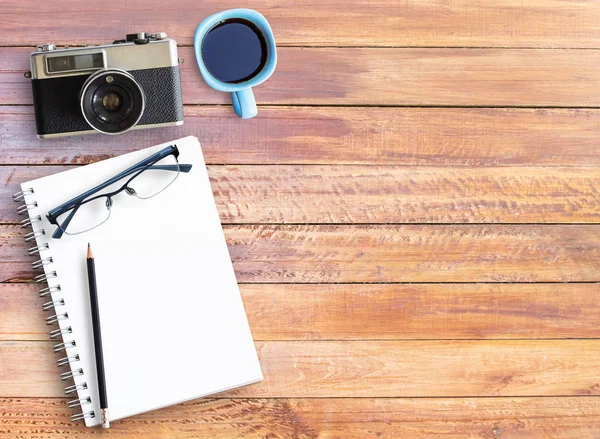 Top view of wooden table with office supplies — Stock Photo, Image