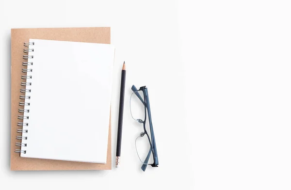 Blank paper notebook on white table background. — Stock Photo, Image