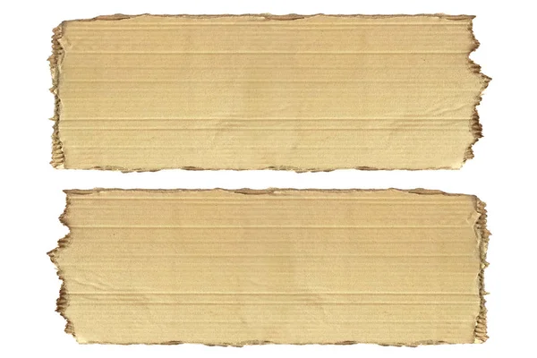 Вид сверху с куском коричневой бумаги, изолированной на белом фоне . — стоковое фото