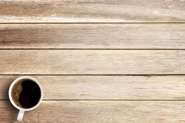 Cup of coffee on a office desk or wood table background. — Stock Photo, Image
