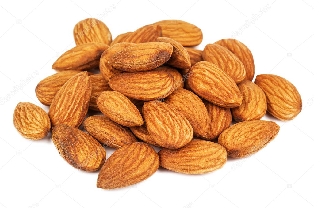 heap of ripe almonds on white background