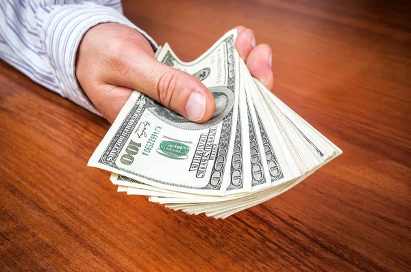 Money (dollars) in the hand — Stock Photo, Image