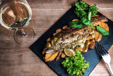 grilled trout and potato with wine